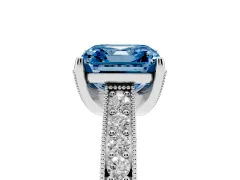 Fancy Blue Asscher Cut Diamond Solitaire Ring Set in White gold with Milgrain-Edged Pavé Band and Prong Setting
