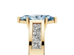 Fancy Blue Marquise Cut Diamond Solitaire Ring Set in Yellow gold with Channel-Set Accent Stones and Prong Setting