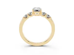Emerald Cut Diamond Five-Stone Prong Set Engagement Ring Set in Yellow gold with Channel Band