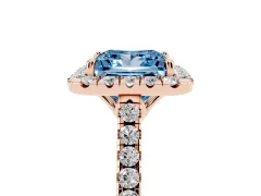 Fancy Blue Princess Cut Diamond Pavé Halo Engagement Ring Set in Rose gold with Pavé Band and Prong Setting