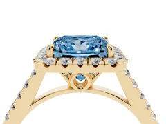 Fancy Blue Princess Cut Diamond Pavé Halo Engagement Ring Set in Yellow gold with Pavé Band and Prong Setting