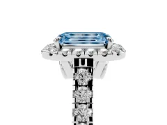 Fancy Blue Emerald Cut Diamond Halo Engagement Ring Set in Silver with Pavé Band and Prong-Set Center