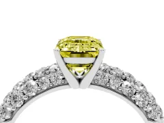 Fancy Yellow Emerald Cut Diamond Pavé Band Solitaire Ring Set in White gold with Close-Set Accent Stones and Prong Setting