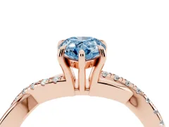 Fancy Blue Pear Cut Diamond Twisted Pavé Band Ring Set in Rose gold with Prong Setting