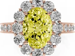 Fancy Yellow Oval Cut Diamond Halo Pavé Engagement Ring Set in Rose gold with Milgrain Detailing