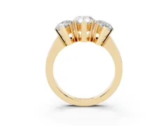 Pear Cut Diamond Three-Stone Ring Set in Yellow gold with Channel-Set Band and Prong Settings