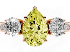 Fancy Yellow Pear Cut Diamond Three-Stone Ring Set in Rose gold with Round Side Stones and Pavé Band