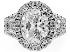 Oval Cut Diamond Halo Split Shank Ring Set in Platinum with Round Accent Stones and Prong Setting