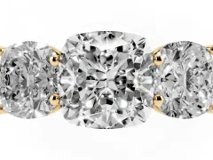 Cushion Cut Diamond Three-Stone Ring Set in Yellow gold with Plain Polished Band