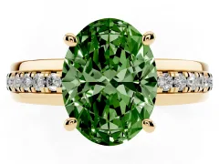 Fancy Green Oval Cut Diamond Solitaire Ring Set in Yellow gold with Channel Set Band and Prong Setting