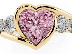 Fancy Pink Heart Cut Diamond Bezel Bypass Ring Set in Yellow gold with Round Accents