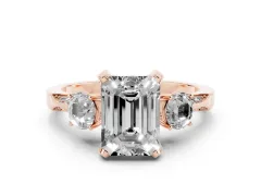 Fancy Black Emerald Cut Diamond Three-Stone Ring Set in Rose gold with Pavé Band and Smaller Side Stones