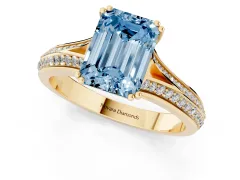 Fancy Blue Emerald Cut Diamond Split Shank Pavé Engagement Ring Set in Yellow gold with Prong-Set Center Stone