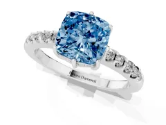 Fancy Blue Cushion Cut Diamond Solitaire Engagement Ring Set in White gold with Pavé Band and Prong Setting