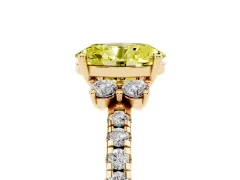 Fancy Yellow Oval Cut Diamond Three-Stone Pavé Ring Set in Yellow gold with Prong Setting