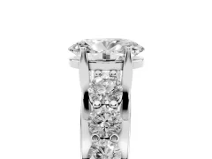 Oval Cut Diamond Pavé Engagement Ring Set in White gold with Prong Setting
