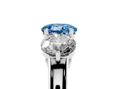 Fancy Blue Round Cut Diamond Three-Stone Ring Set in Silver with Prong Setting and Plain Band