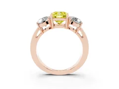 Fancy Yellow Cushion Cut Diamond Three-Stone Ring Set in Rose gold with Round Side Stones and Classic Band