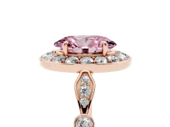 Fancy Pink Oval Cut Diamond Halo Engagement Ring Set in Rose gold with Twisted Band and Prong Setting