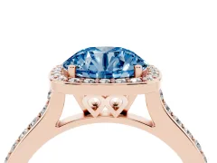 Fancy Blue Round Cut Diamond Halo Engagement Ring Set in Rose gold with Round Pavé Shoulders and Heart Gallery
