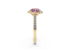 Fancy Pink Heart Cut Diamond Pavé Halo Engagement Ring Set in Yellow gold with Pavé Band and Prong Setting