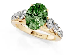 Fancy Green Oval Cut Diamond Solitaire Ring Set in Yellow gold with Pavé-Set Band and Prong Setting