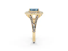 Fancy Blue Emerald Cut Diamond Double Halo Ring Set in Yellow gold with Pavé Split Shank and Prong Setting