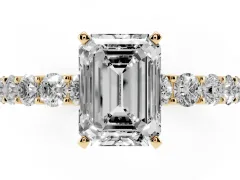 Emerald Cut Diamond Solitaire Ring Set in Yellow gold with Shared Prong Pavé Band