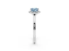Fancy Blue Oval Cut Diamond Halo Engagement Ring Set in White gold with Pavé Band and Rising Shoulders