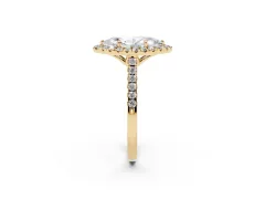 Marquise Cut Diamond Pavé Halo Engagement Ring Set in Yellow gold with Pavé Band and Prong Setting