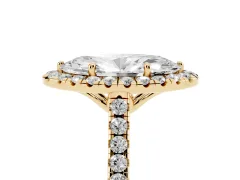 Marquise Cut Diamond Pavé Halo Engagement Ring Set in Yellow gold with Pavé Band and Prong Setting