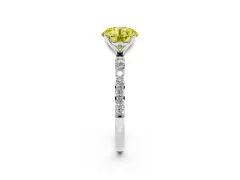 Fancy Yellow Round Cut Diamond Solitaire Engagement Ring Set in White gold with Round Pavé Band and Prong Setting