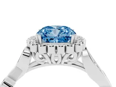 Fancy Blue Cushion Cut Diamond Halo Ring Set in Platinum with Leaf Motif Split Shank and Prong Setting