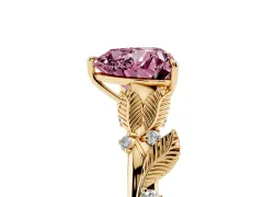 Fancy Pink Heart Cut Diamond Solitaire Ring Set in Yellow gold with Leaf Motif Band