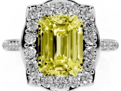 Fancy Yellow Emerald Cut Diamond Halo Ring Set in White gold with Pavé-Lined Shoulders and Prong Setting