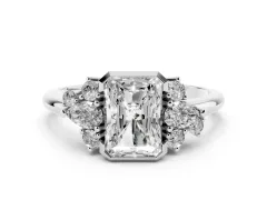 Radiant Diamond Cluster Side Stone Ring Set in White gold with Pear and Round Side Stones