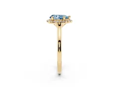 Fancy Blue Pear Cut Diamond Halo Engagement Ring Set in Yellow gold with Pavé Band and Rising Shoulders