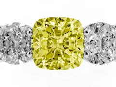 Fancy Yellow Cushion Cut Diamond Three-Stone Ring Set in Platinum with Plain Polished Band