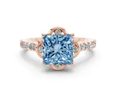 Fancy Blue Princess Cut Diamond Solitaire Ring Set in Rose gold with Pavé Band and Floral Prong Setting