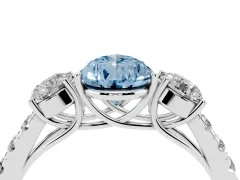 Fancy Blue Pear Cut Diamond Three-Stone Ring Set in Silver with Round Side Stones and Delicate Pavé Band