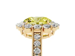 Fancy Yellow Oval Cut Diamond Halo Pavé Engagement Ring Set in Yellow gold with Milgrain Detailing