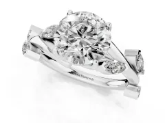 Round Cut Diamond Solitaire Ring Set in Silver with Twisted Marquise Accent Band