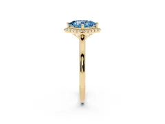 Fancy Blue Princess Cut Diamond Halo Engagement Ring Set in Yellow gold with Pavé Band and Rising Shoulders