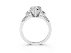 Heart Cut Diamond Three-Stone Ring Set in Platinum with Pavé Band and Smaller Side Stones
