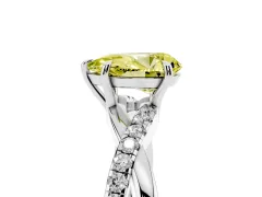 Fancy Yellow Pear Cut Diamond Twisted Pavé Band Ring Set in Platinum with Prong Setting