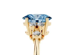 Fancy Blue Oval Cut Diamond Cluster Ring Set in Yellow gold with Plain Band and Prong Setting