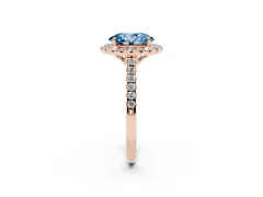 Fancy Blue Oval Cut Diamond Pavé Halo Engagement Ring Set in Rose gold with Pavé Band and Prong Setting