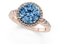 Fancy Blue Round Cut Diamond Halo Ring Set in Rose gold with Pavé Shoulders and Halo-Framed Center