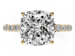 Cushion Cut Diamond Solitaire Engagement Ring Set in Yellow gold with Round Pavé Band and Prong Setting