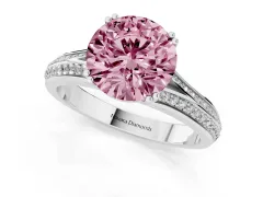 Fancy Pink Round Cut Diamond Split Shank Pavé Engagement Ring Set in White gold with Prong-Set Center Stone